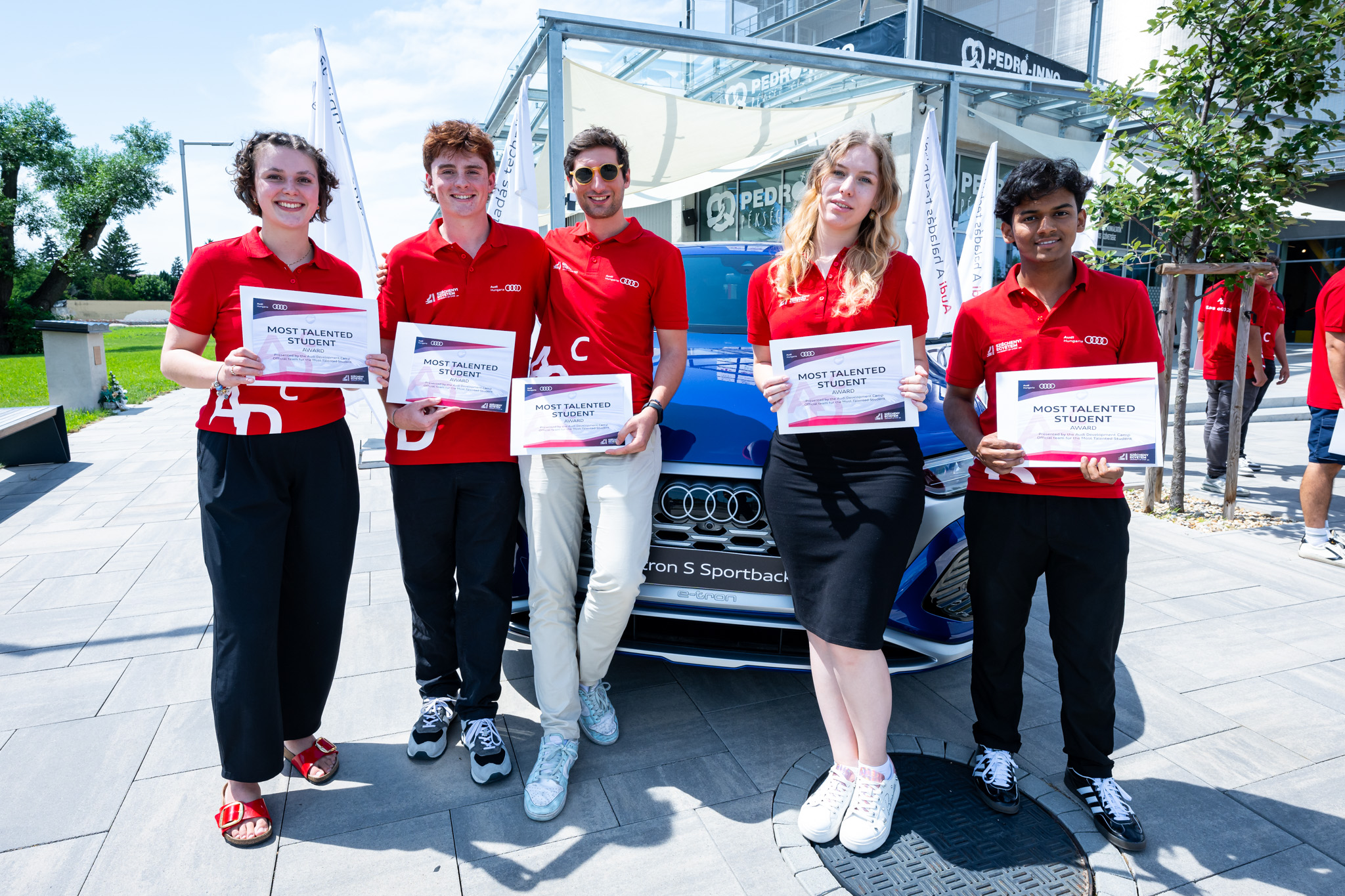 Five of the most talented students were also awarded: Marit Papke (German student, Catholic University of Eichstätt-Ingolstadt), Matthew Pickering (American student, Quinnipiac University), Edoardo Guglielmi (Italian student, University of Automotive Engineering of Emilia-Romagna), Nina Novoselt (Austrian student, University of Klagenfurt – Alps-Adriatic), and Kiran Vaddi (Indian student, Landshut University of Applied Sciences) (Photo: Gergely Nagy)